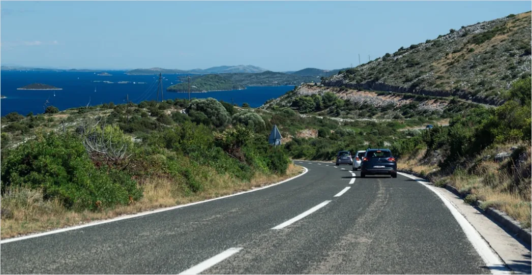 Detail Coastal Highway Driving Convertible Sea View Number 17