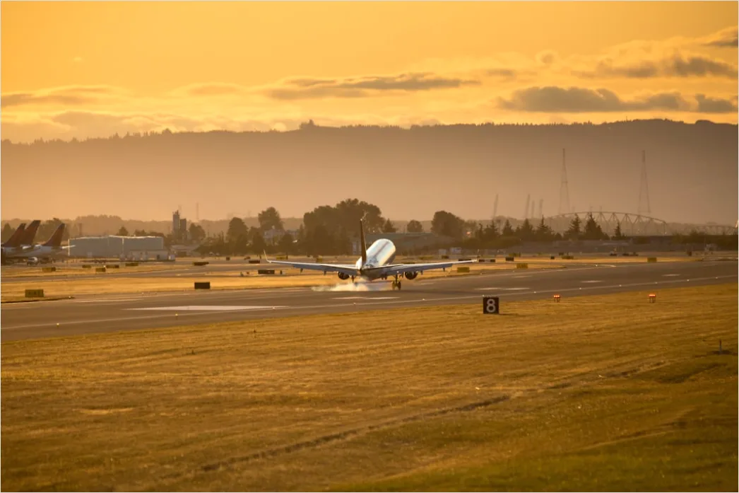 Detail Commercial Airplane Taking Off At Sunset Number 16