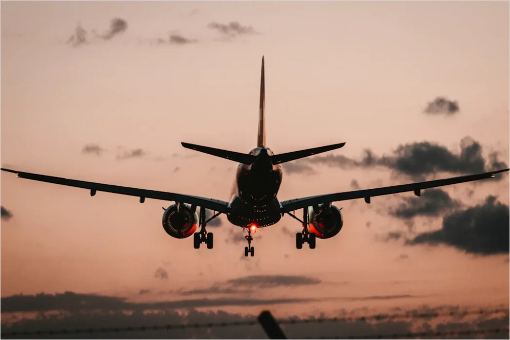 Detail Commercial Airplane Taking Off At Sunset Number 10
