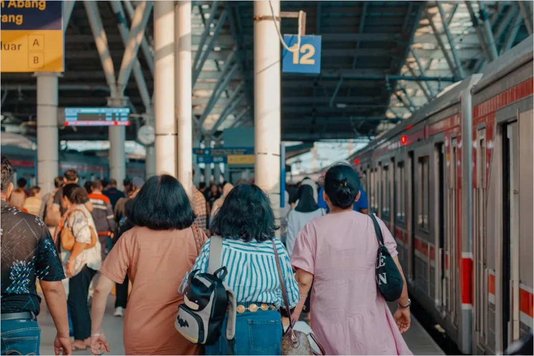 Detail Commuter Train Passengers Boarding At Station Number 16