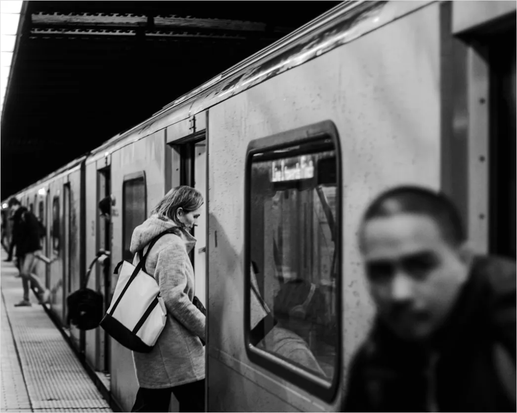 Detail Commuter Train Passengers Boarding At Station Number 17