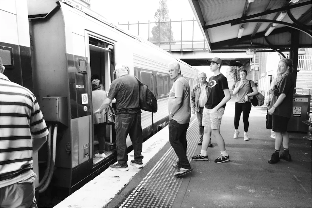 Detail Commuter Train Passengers Boarding At Station Number 8