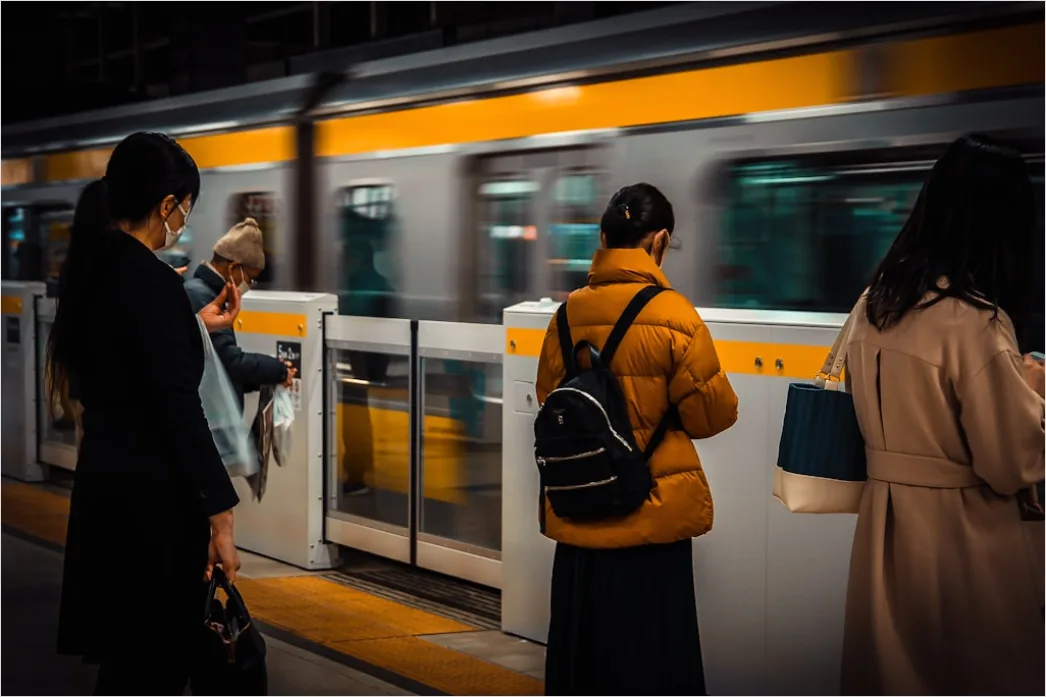 Detail Commuter Train Passengers Boarding At Station Number 9
