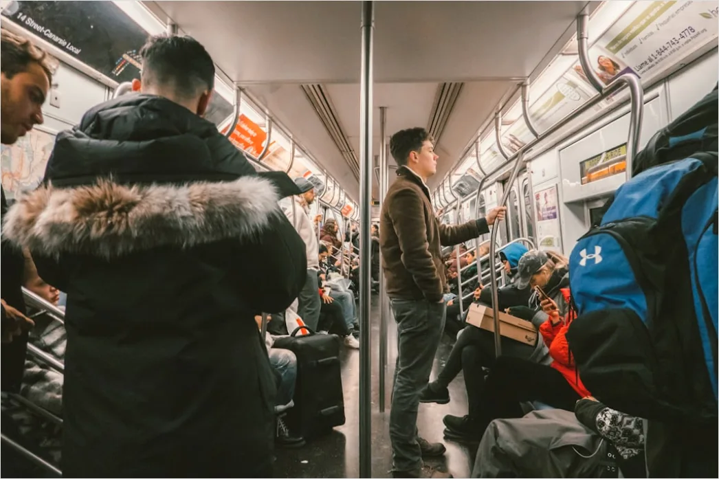 Commuters On Subway Train Reading Phones 63a5
