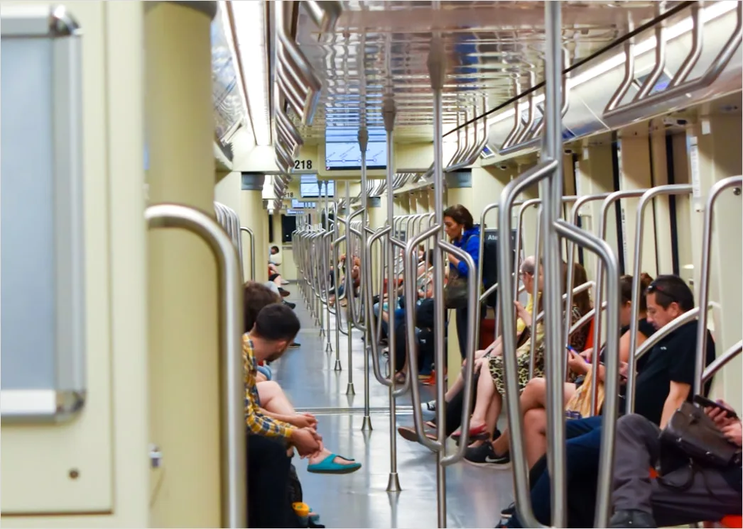 Detail Commuters On Subway Train Reading Phones Number 11