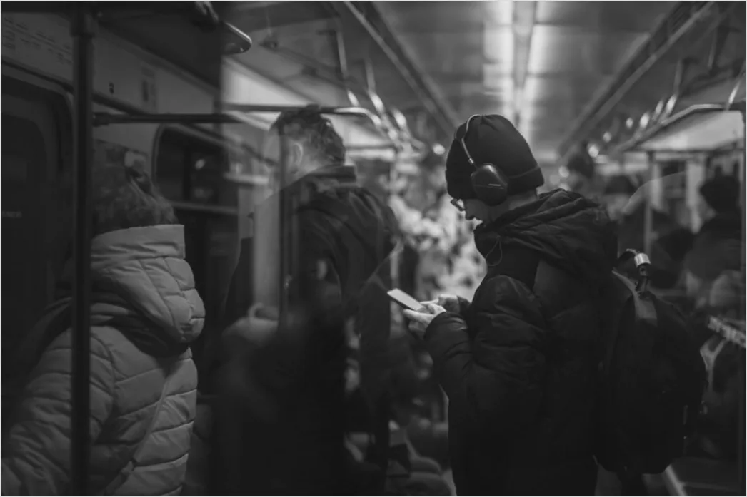 Detail Commuters On Subway Train Reading Phones Number 12