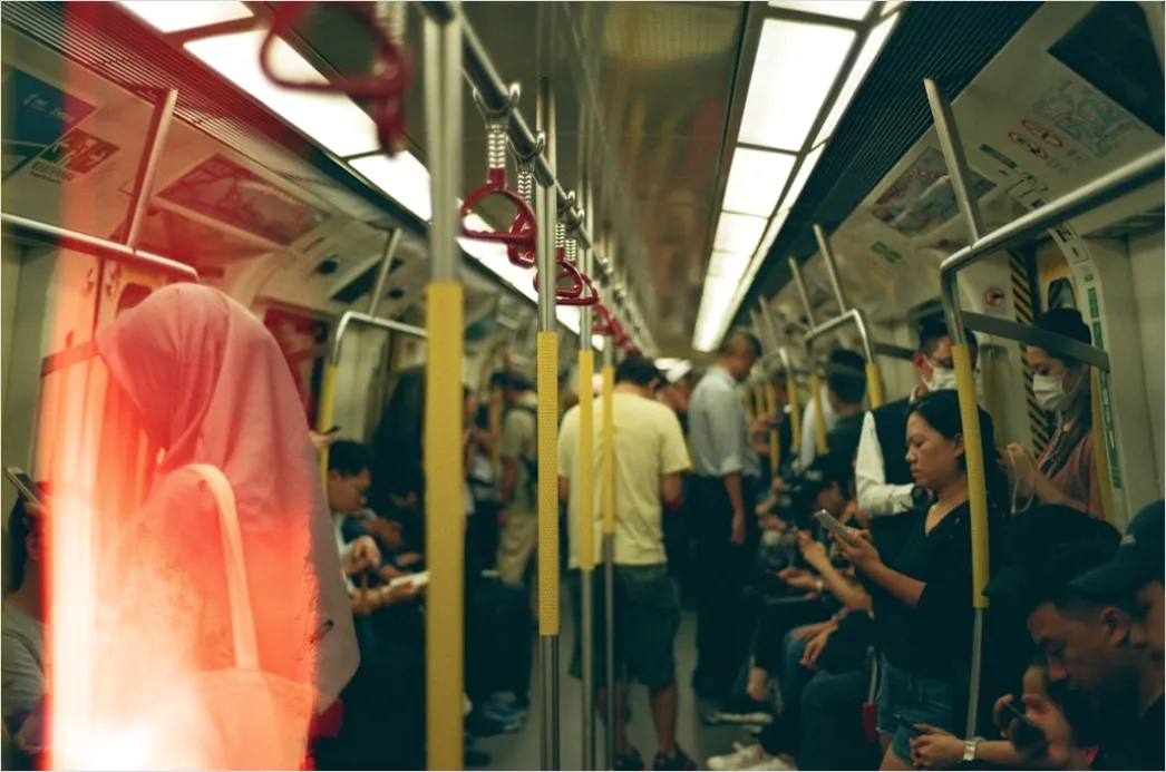 Detail Commuters On Subway Train Reading Phones Number 16