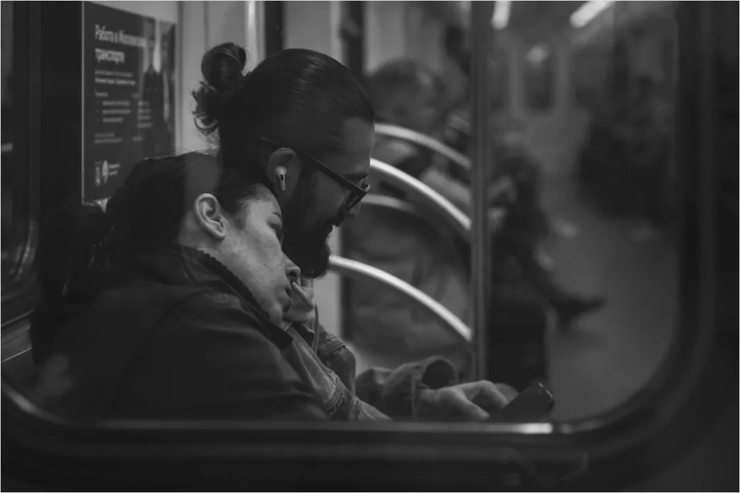 Detail Commuters On Subway Train Reading Phones Number 17