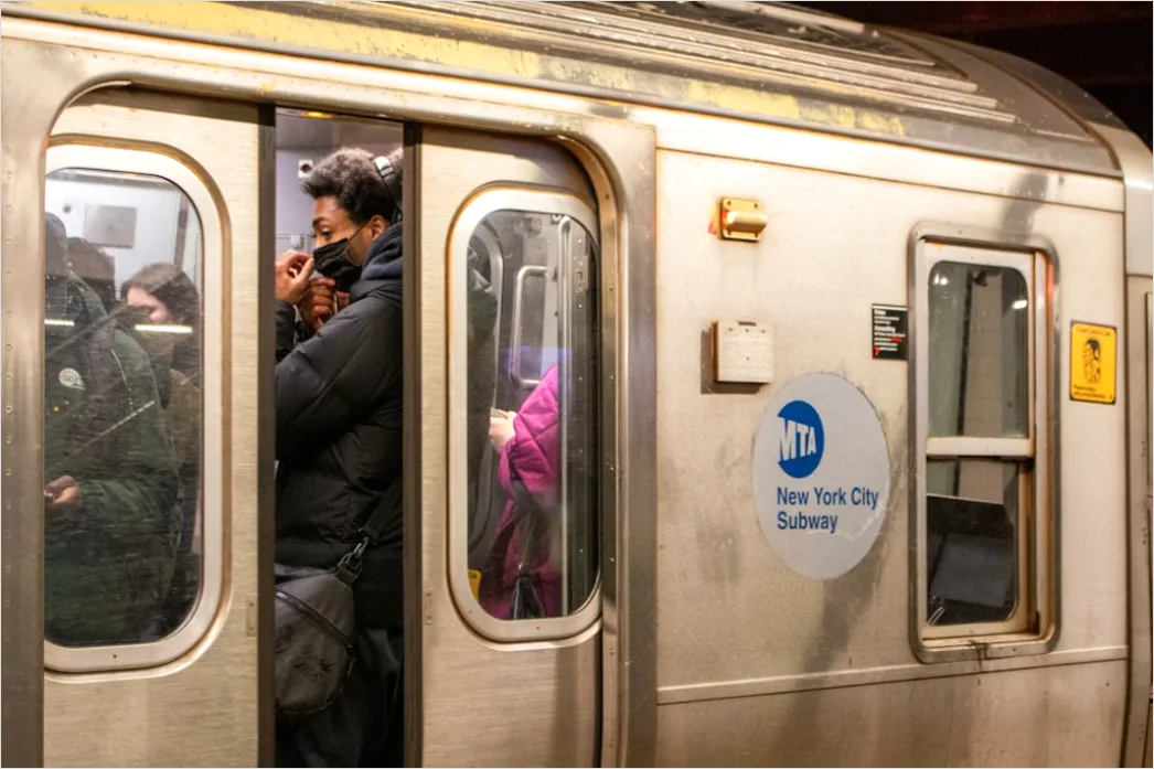 Detail Commuters On Subway Train Reading Phones Number 19