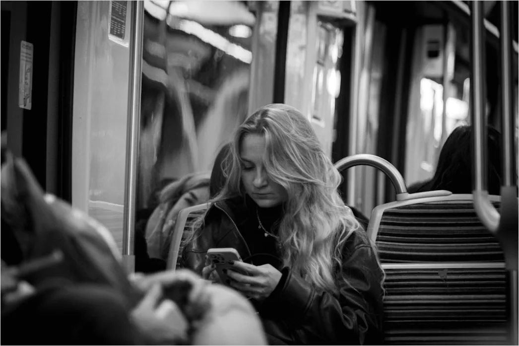Detail Commuters On Subway Train Reading Phones Number 20