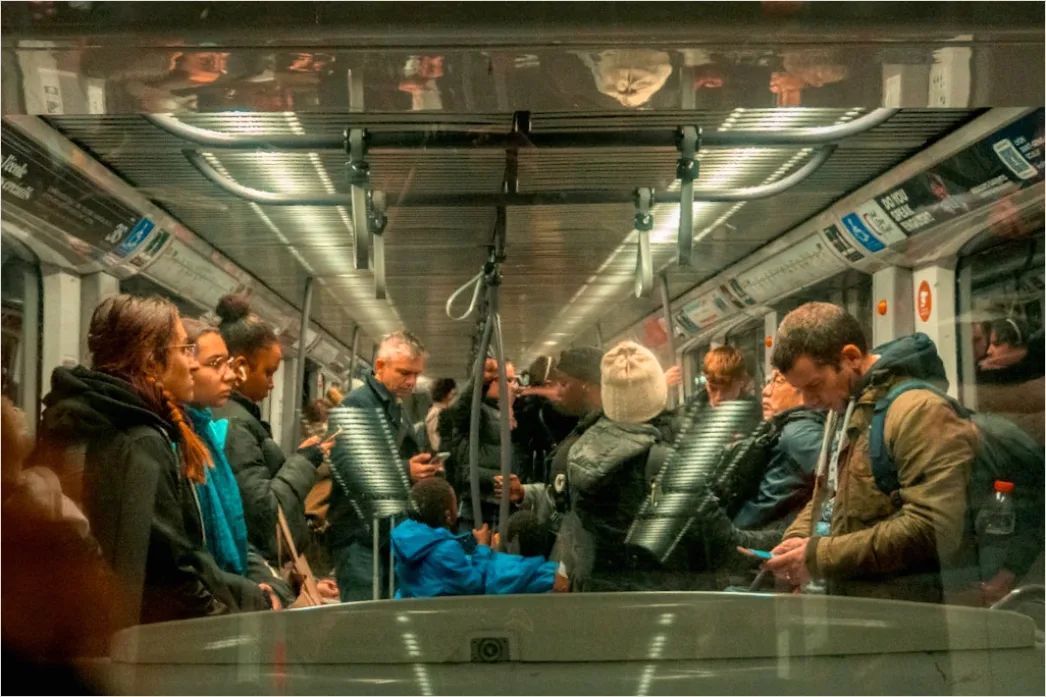 Detail Commuters On Subway Train Reading Phones Number 4