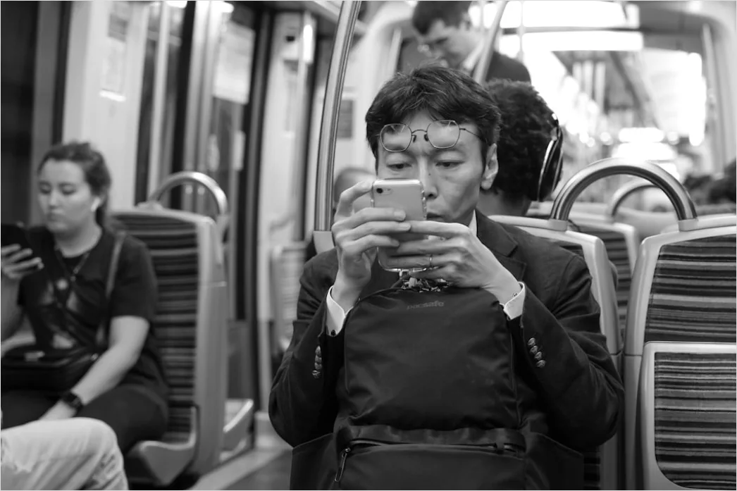Detail Commuters On Subway Train Reading Phones Number 5