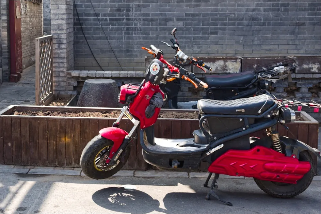 Detail Electric Motorcycle Charging Urban Environment Number 3