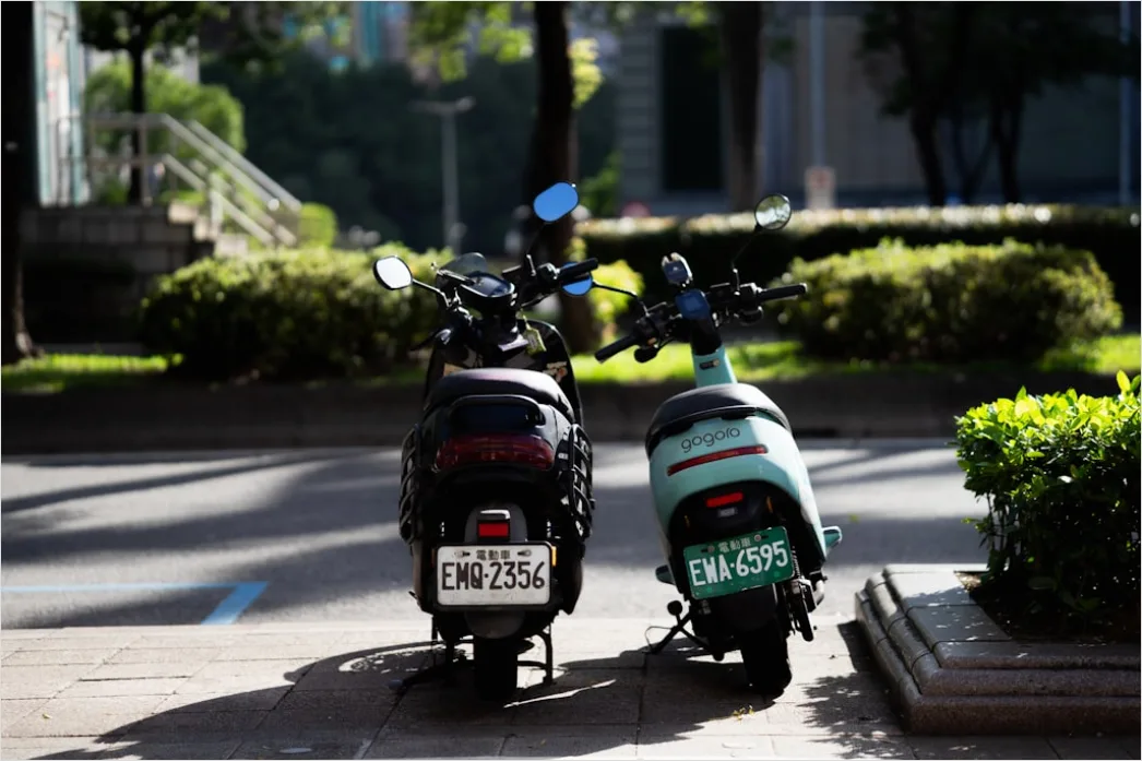 Detail Electric Motorcycle Charging Urban Setting Number 13