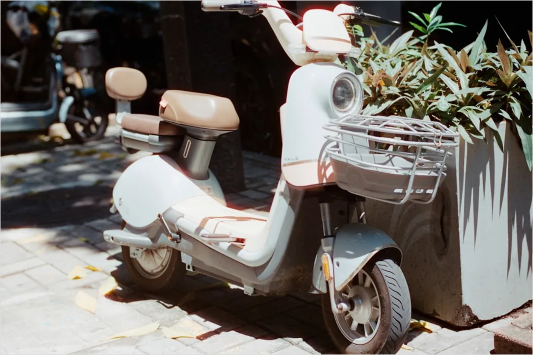 Detail Electric Motorcycle Charging Urban Setting Number 9