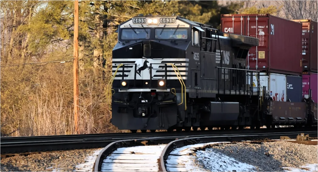 Detail Freight Train Carrying Containers On Track Number 7