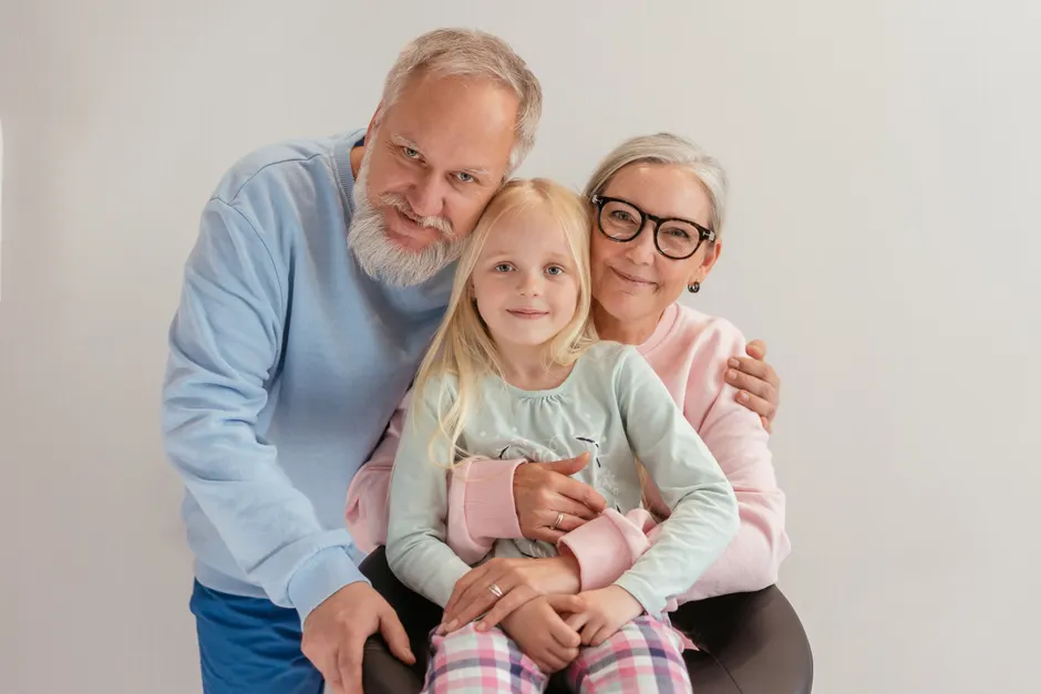 Grandparent And Grandchild Portrait Warm Moment Bed4