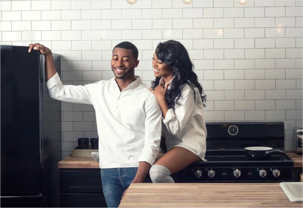 Detail Lifestyle Portrait Couple Cooking Together Kitchen Number 16