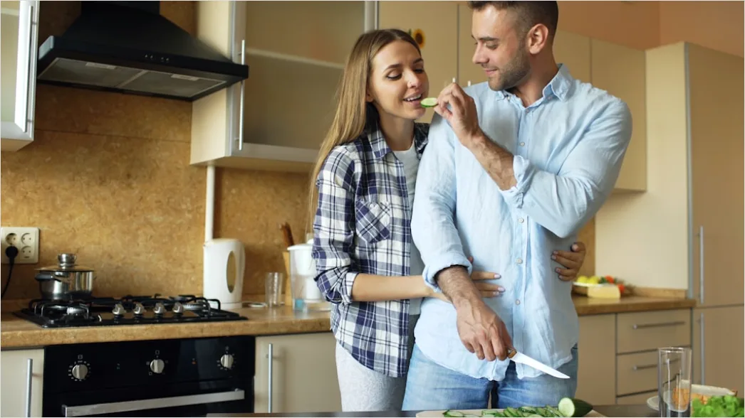 Detail Lifestyle Portrait Couple Cooking Together Kitchen Number 19