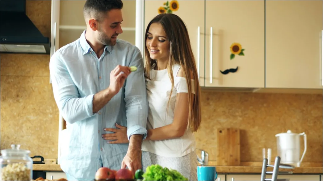 Detail Lifestyle Portrait Couple Cooking Together Kitchen Number 20
