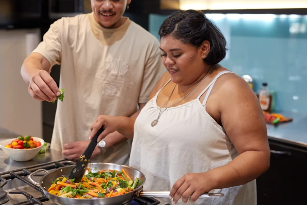 Detail Lifestyle Portrait Couple Cooking Together Kitchen Number 5