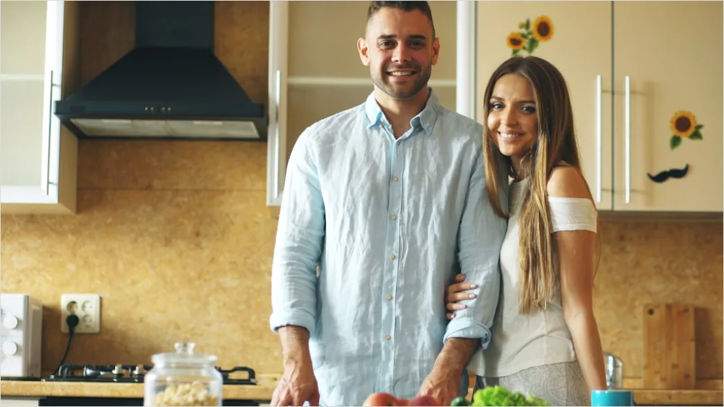 Detail Lifestyle Portrait Couple Cooking Together Kitchen Number 9
