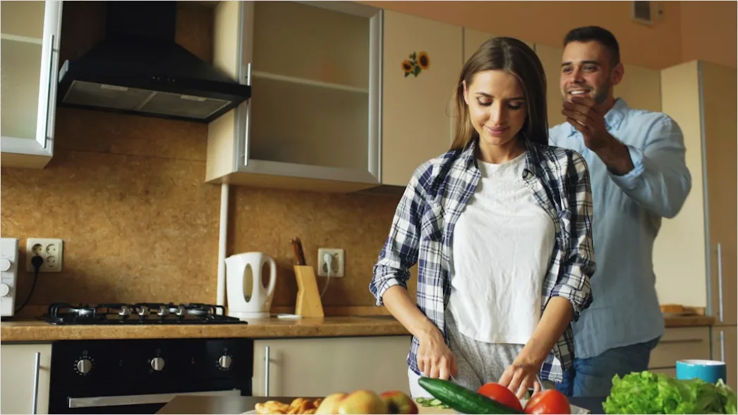 Detail Lifestyle Portrait Couple Cooking Together Kitchen Number 10