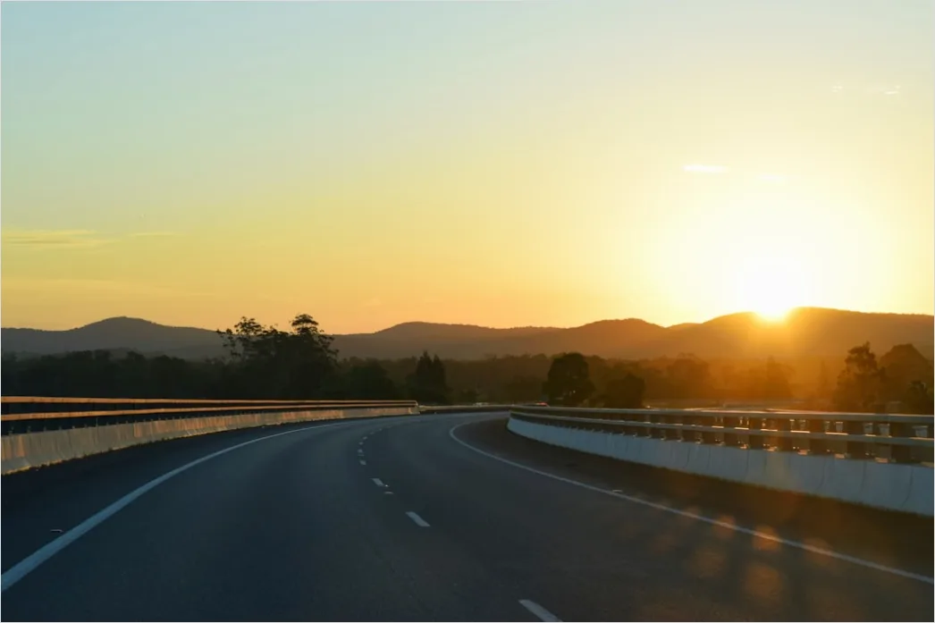 Detail Motorcycle On Open Highway Sunset Landscape Number 4