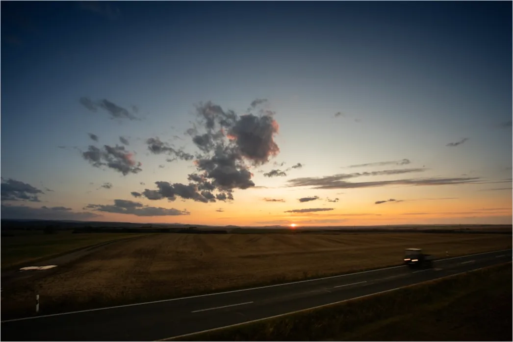 Detail Motorcycle On Open Highway Sunset Landscape Number 6