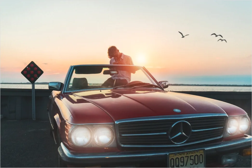 Detail Road Trip Couple Driving Convertible Sunset Number 2