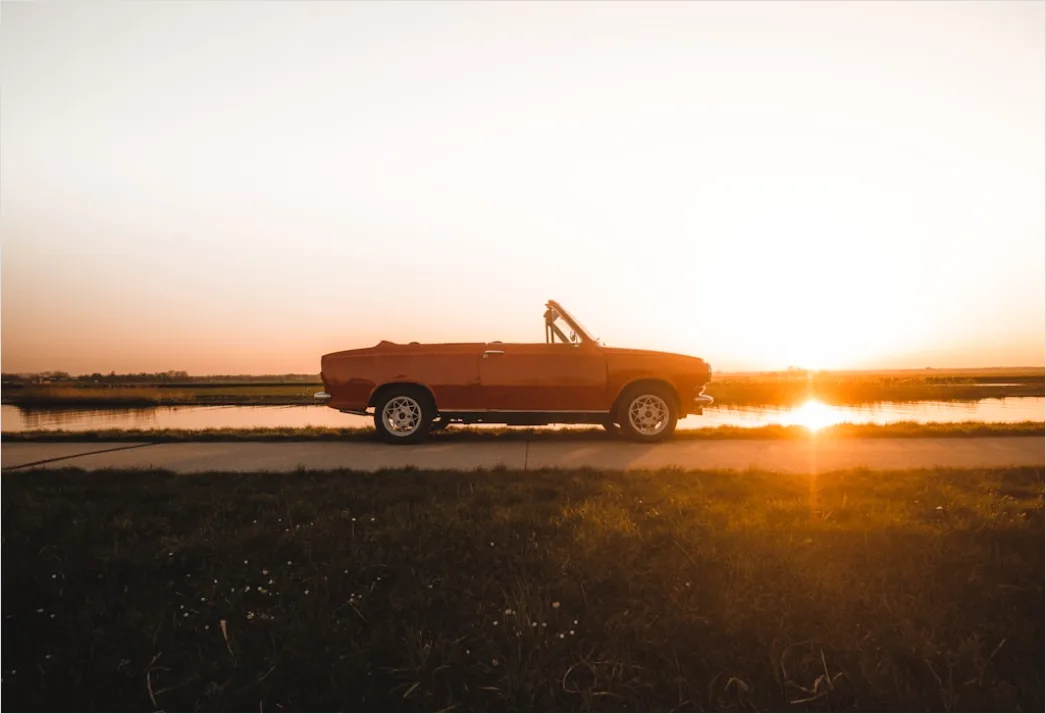 Detail Road Trip Couple Driving Convertible Sunset Number 9