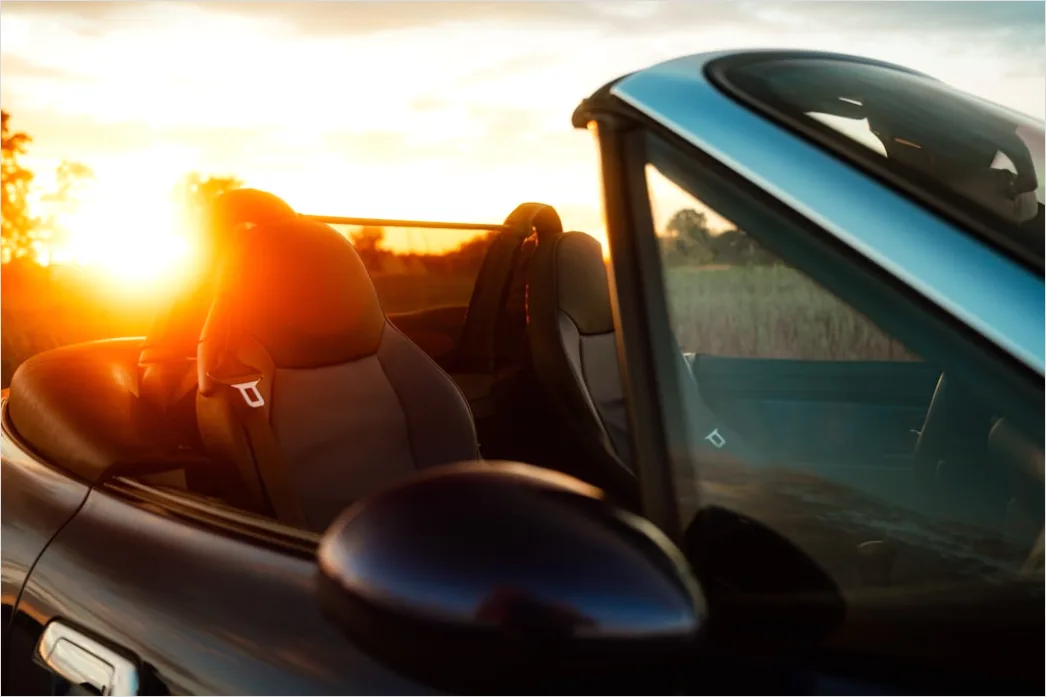 Detail Road Trip Couple Driving Convertible Sunset Number 10