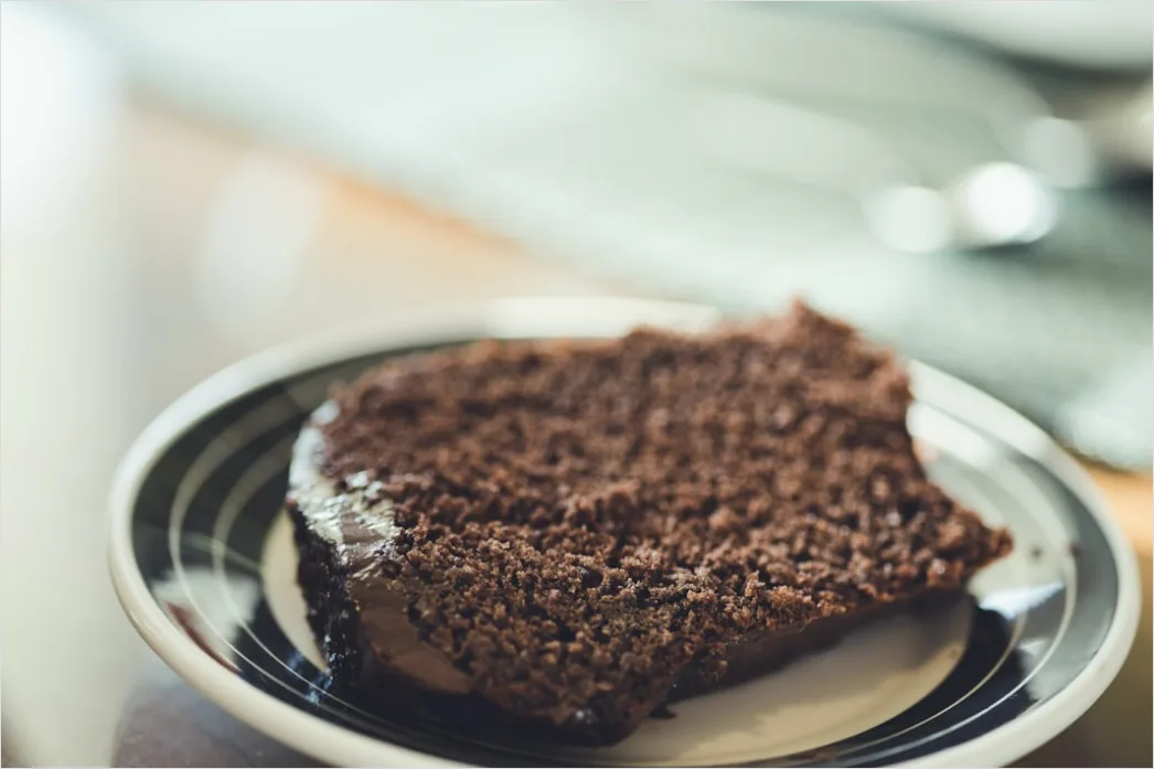Schokoladenkuchen Stueck Teller Nahaufnahme 48d0