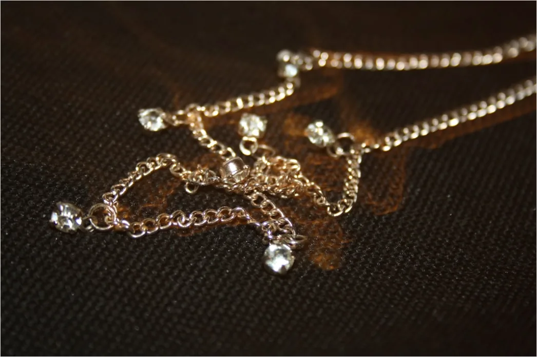 Detail Schmuck Layering Gold Ketten Nahaufnahme Number 9