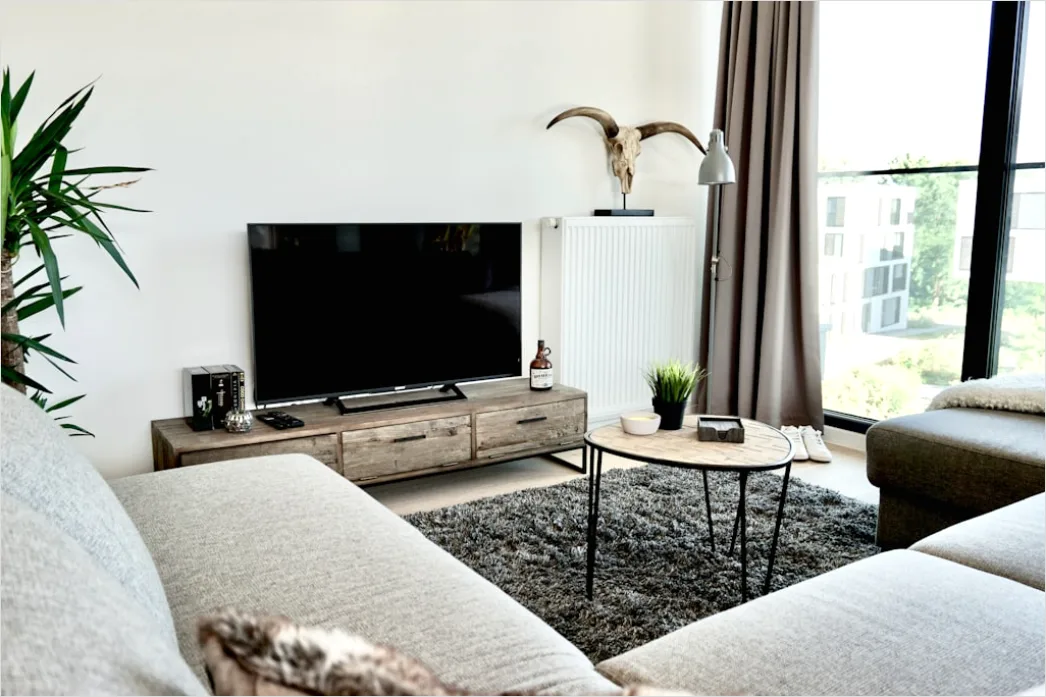 Detail Wohnzimmer Mit Runder Couchtisch Deko Foto Number 2