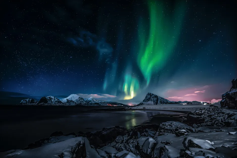 Detail Aurora Over Snowy Mountains Number 5