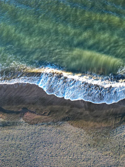 Detail Blue Ocean Aerial Shoreline Photo Number 5