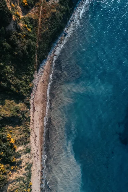 Detail Blue Ocean Aerial Shoreline Photo Number 8