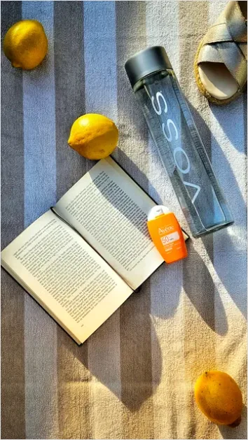 Detail Sunscreen Bottle Flat Lay Photo Number 9
