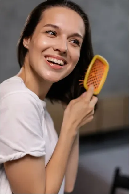 Woman Brushing Hair Photo 3ce4