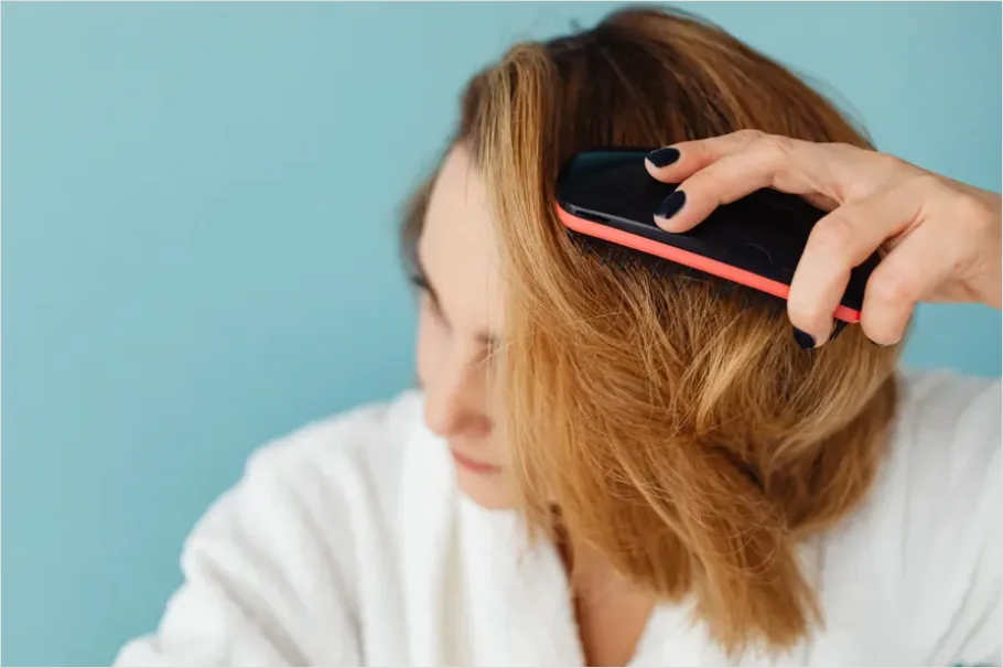 Detail Woman Brushing Hair Photo Number 11