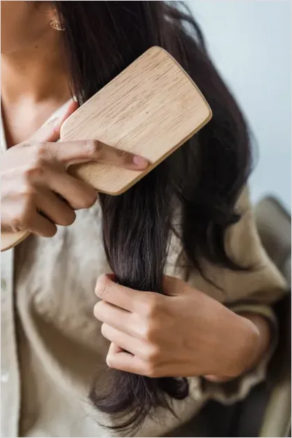 Detail Woman Brushing Hair Photo Number 13