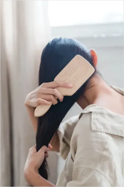 Detail Woman Brushing Hair Photo Number 14