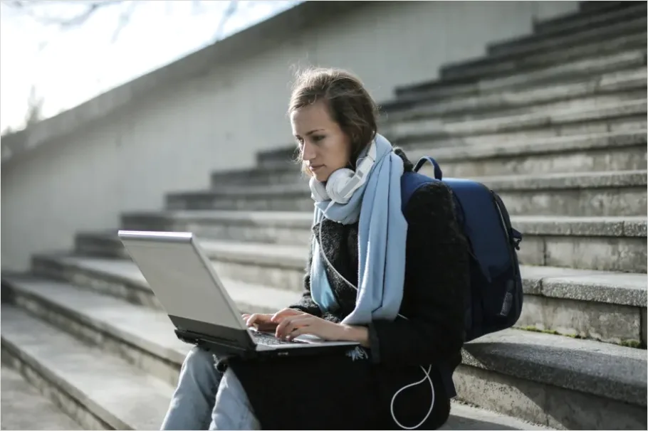 Detail Student Wearing Headphones Studying Photo Number 2
