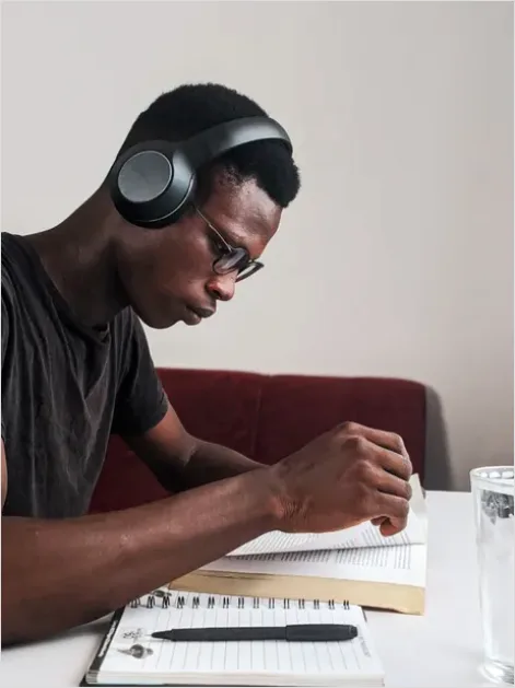 Detail Student Wearing Headphones Studying Photo Number 13