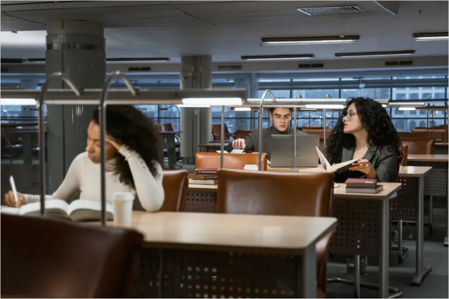 Detail Students Studying In Library Photo Number 2
