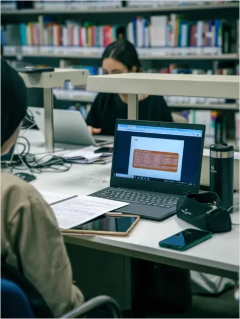 Detail Students Studying In Library Photo Number 6
