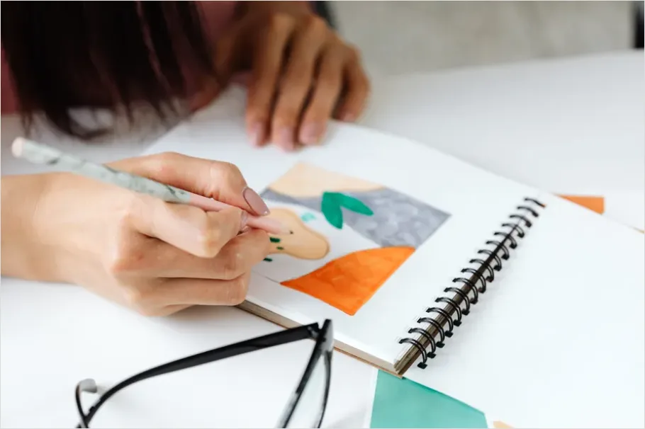 Artist Hands Drawing In Sketchbook Cf13