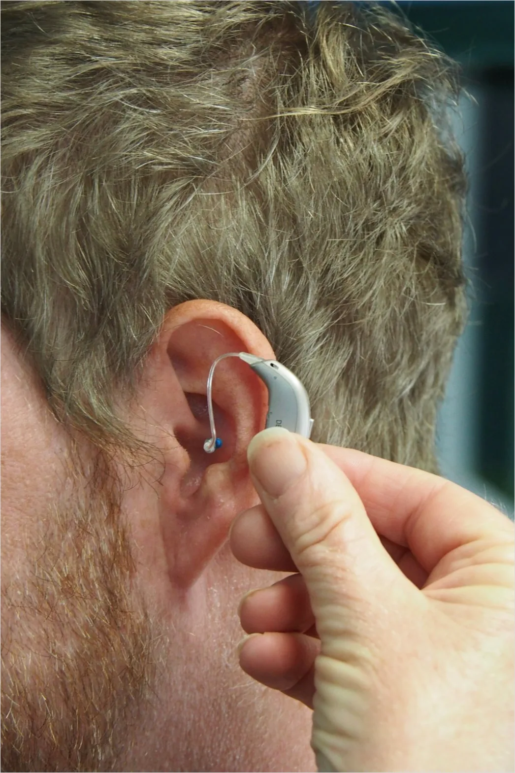 Detail Hearing Aids In Hand Close Up Number 2