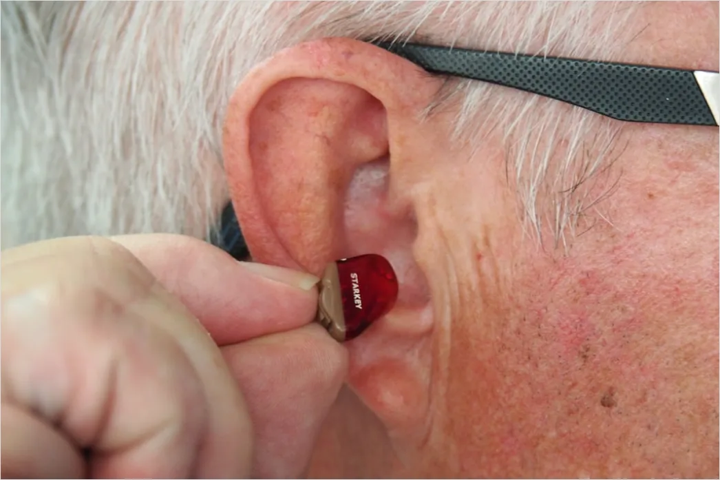 Detail Hearing Aids In Hand Close Up Number 5